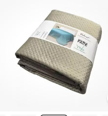 Velvety quilted grey double bedspread